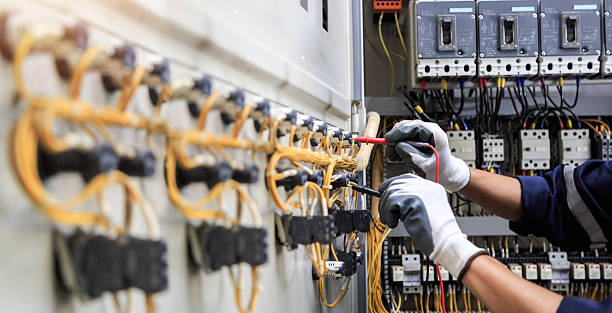 Professional Electrician technician working in Shady Shores, TX